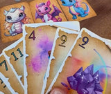 Good Idea Games Dragon Tricks – A Family Trick-Taking Card Game with a Unique Twist, Egg-Hatching Gameplay, and Adorable Baby Dragons